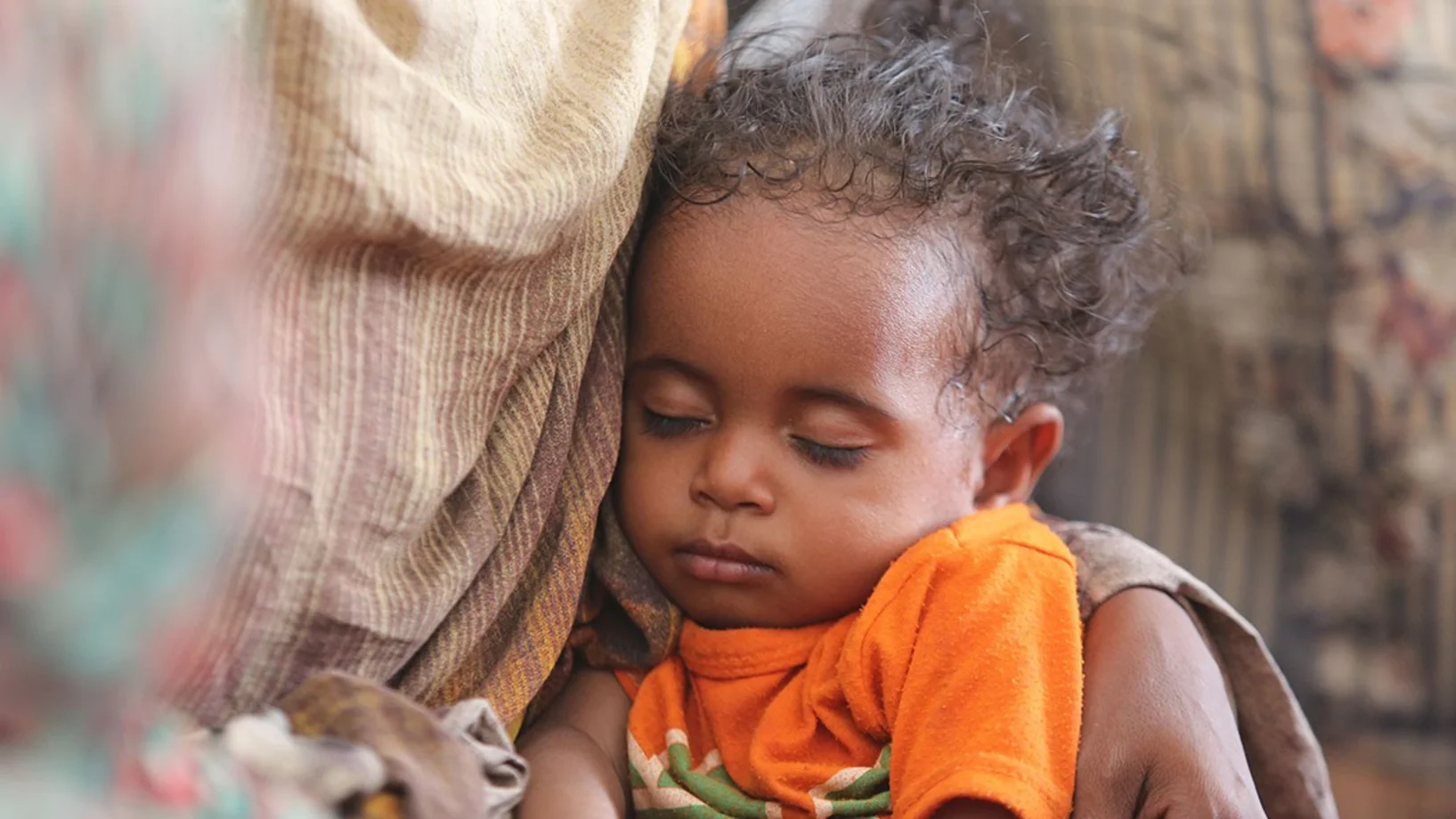 Kind schläft Sudan